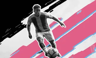 A black and white soccer player dribbles a ball against a pink and white abstract background.