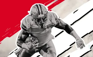 Football player in uniform running with the ball, black and white with red accent.