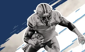 A black and white image of a football player running with the ball against a blue and white background.