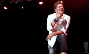 carlos vives performing on stage at the lakelive festival in swiss