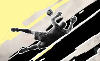 A soccer goalie dives to catch a ball against a black and yellow abstract background.