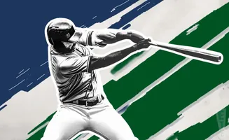 A baseball player swings a bat against a backdrop of blue and green stripes.