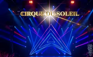 Cirque du Soleil logo with stage lights and a starry effect.