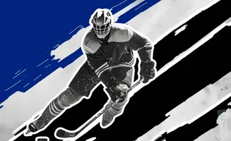 A hockey player in uniform on a black and blue background.