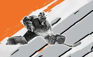 Hockey goalie in a split making a save with a stick.
