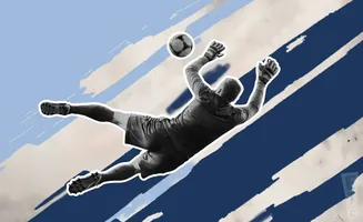 A soccer goalie dives to catch the ball against a blue and white abstract background.