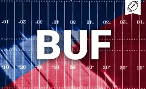 American football field with red and blue zones and yard markers.