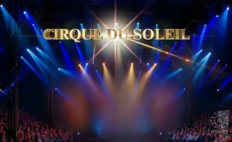 A stage with bright spotlights and the words 
