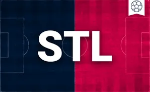 Soccer field split between blue and red halves, with a soccer ball icon in the top right corner.