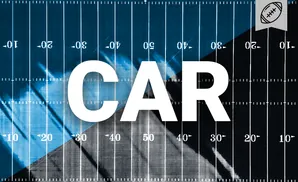 American football field with yard markers and a football emblem.