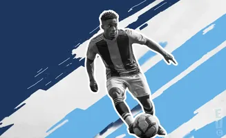 A black and white image of a soccer player dribbling a ball against a blue and white abstract background.
