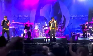 A band performs on a stage with 