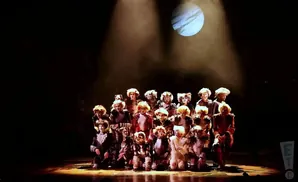 A cast of performers in 