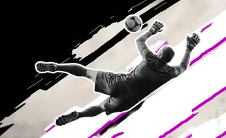 Goalkeeper diving to catch a soccer ball in mid-air.
