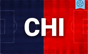 a chicago fire fc goalkeeper soccer player diving to make a save