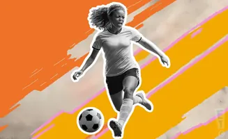 A Black woman in a soccer uniform dribbles a ball with a colorful, abstract background.