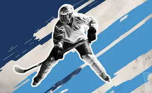 A hockey player in full gear skates forward, stick in hand, against a blue and white striped background.