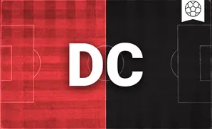 A soccer field split vertically by red and black, with a soccer ball icon in the top right corner.