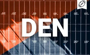 A split football field, orange on the left and navy blue on the right, with yard markers.