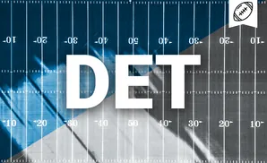 American football field markings on a blue and gray background, with a football icon in the upper right corner.