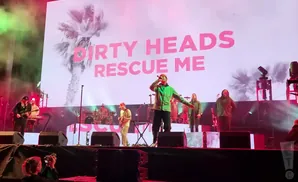A band performs on stage with 