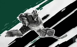Black and white hockey goalie in a crouch, with green and black graphic elements.