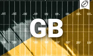 American football field, half green and half gold, with yard markers and a football emblem.