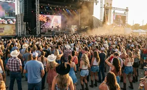 A large crowd enjoys a country music concert in Nebraska.
