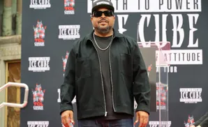 Rapper Ice Cube poses at his handprint ceremony at TCL Chinese Theatre.