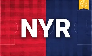 a new york red bulls soccer player kicking the ball