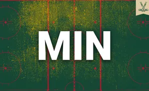 A grunge-textured ice hockey rink with yellow speckles and red markings.