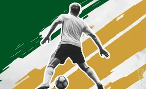 Black and white image of a soccer player dribbling a ball, with green and yellow abstract stripes behind them.