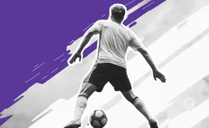 Soccer player in action, viewed from behind, with a purple and white abstract background.