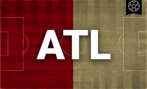 Soccer field split down the middle, red on the left, tan on the right. A soccer ball icon is in the top right corner.