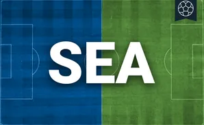 a seattle sounders fc goalkeeper soccer player diving to make a save