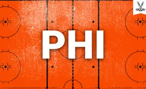 An orange hockey rink with black lines and markings, including circles and a center ice logo.