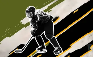 A hockey player in silhouette, holding a stick.