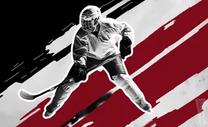 Black and white image of a hockey player in uniform against a red and white striped background.
