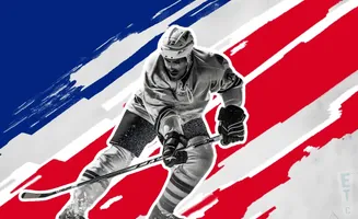 Hockey player in action with a red, white, and blue striped background.
