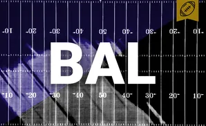 Football field with yard lines and numbers, split into purple and black halves, with a golden football logo.