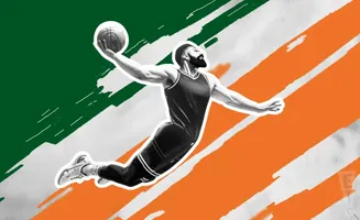A basketball player in mid-air, holding a ball, against a green and orange background.