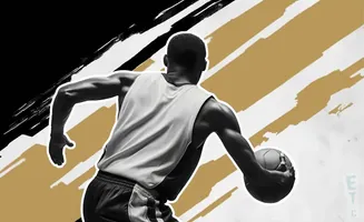 A basketball player dribbles the ball, his back to the viewer.