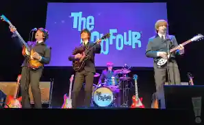 the fab four tribute band performing live at the moore theatre in seattle, washington.