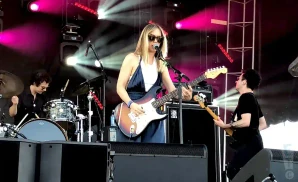 a picture of liz phair performing on stage at the innings festival in tempe arizona