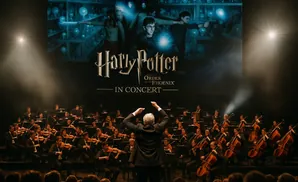 Harry Potter in Concert: A conductor leads an orchestra performing live to a projection of Harry Potter and the Order of the Phoenix.