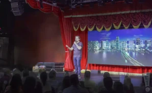 el george harris on stage with musician felix martin