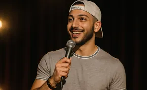 A man in a gray shirt and a 