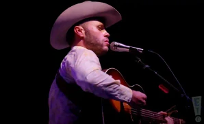 charley crockett performing at the whitewater amphitheater in new braunfels texas