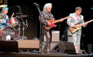 marty stuart playing the electric guitar at stanford hall in lutterworth england