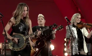 the chicks group shot performing on stage